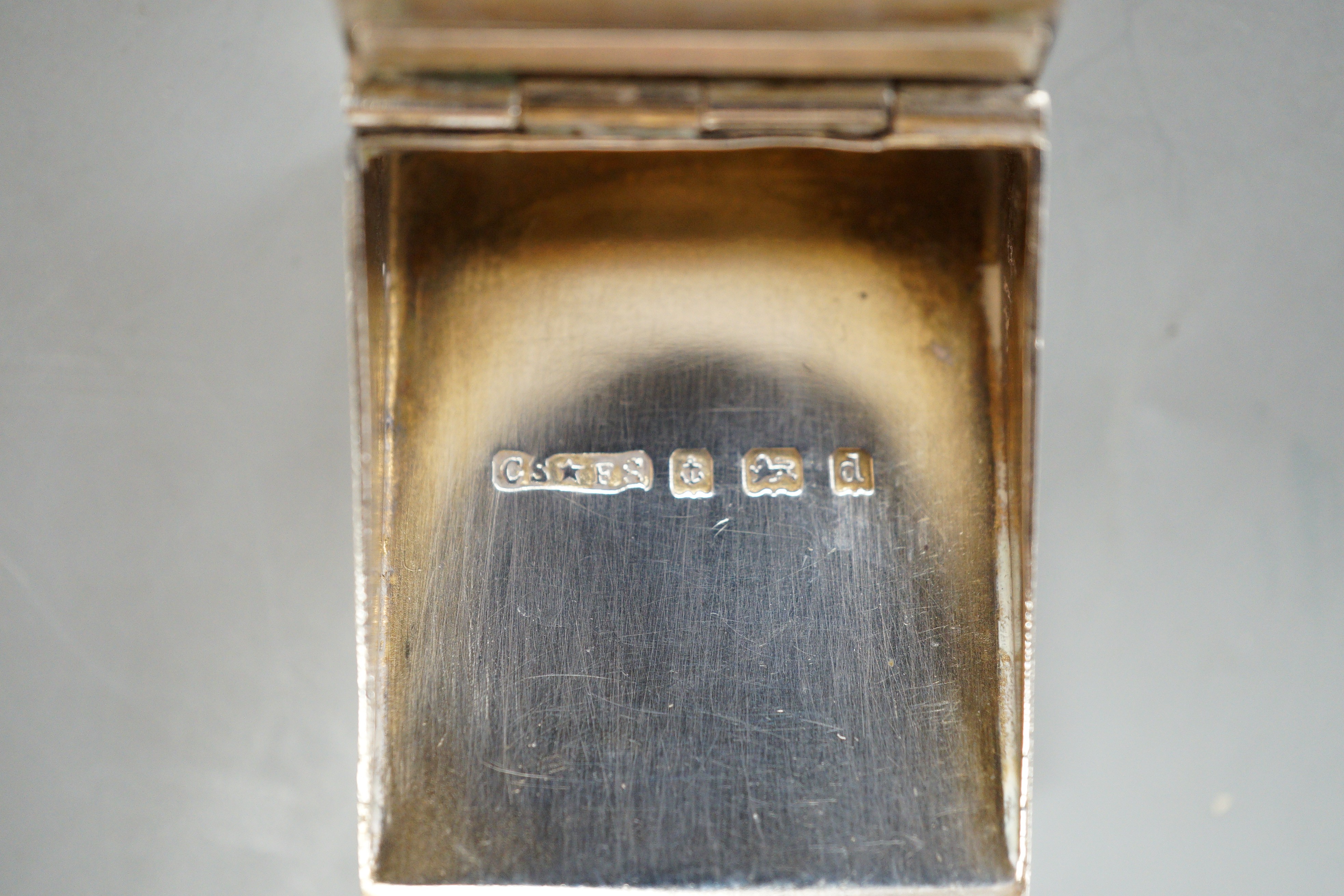 An Edwardian silver hinged twin compartment rectangular stamp case, Saunders & Shepherd, Birmingham, 1903, 31mm.